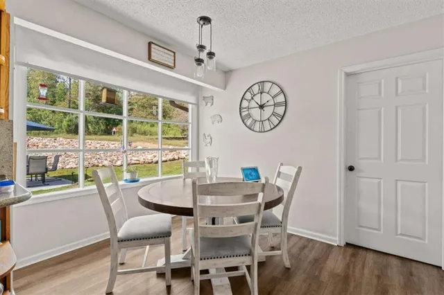 a bedroom with a bed and with furniture