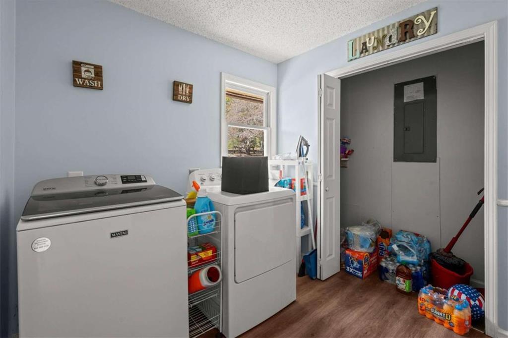 6058 Mt Zion Road Waco, GA 30182 - Photo 38 of 72 a utility room with dryer and washer