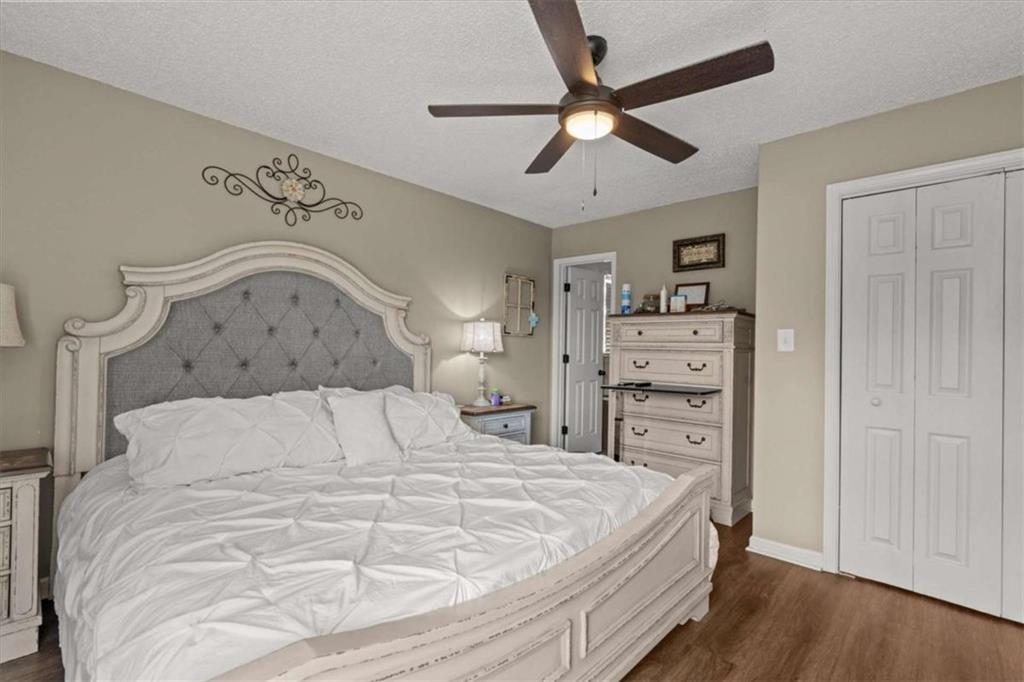 6058 Mt Zion Road Waco, GA 30182 - Photo 41 of 72 a large bed sitting in a bedroom and dresser