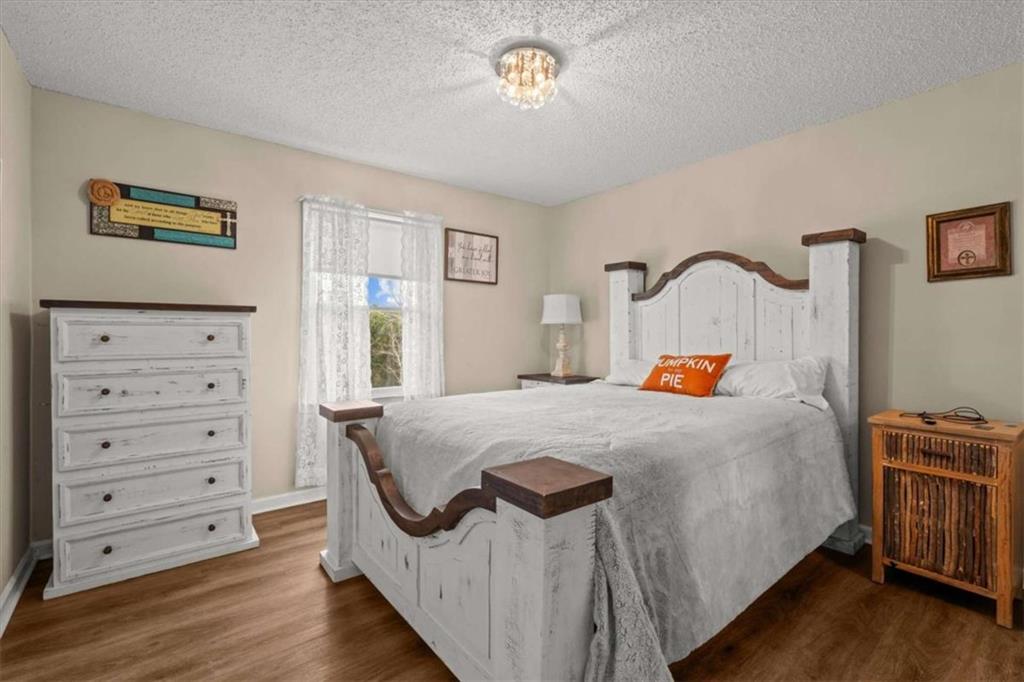 6058 Mt Zion Road Waco, GA 30182 - Photo 45 of 72 a bedroom with a bed and with furniture