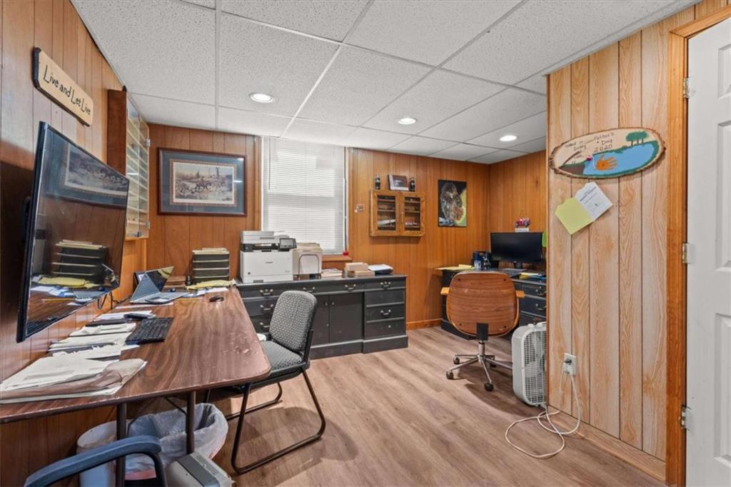 6058 Mt Zion Road Waco, GA 30182 - Photo 50 of 72 a workspace with furniture and a flat screen tv