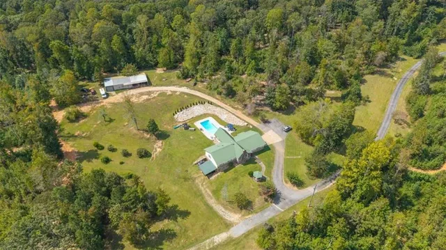 a view of a lake with a yard