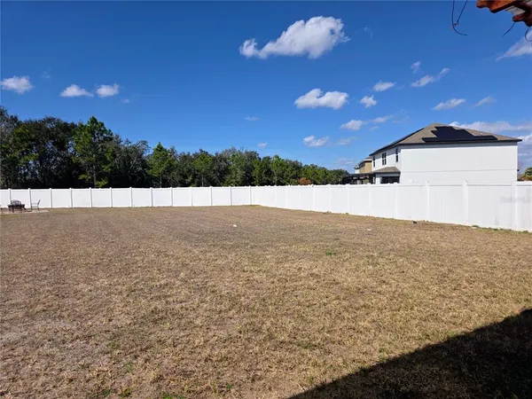 a view of an ocean and a mountain