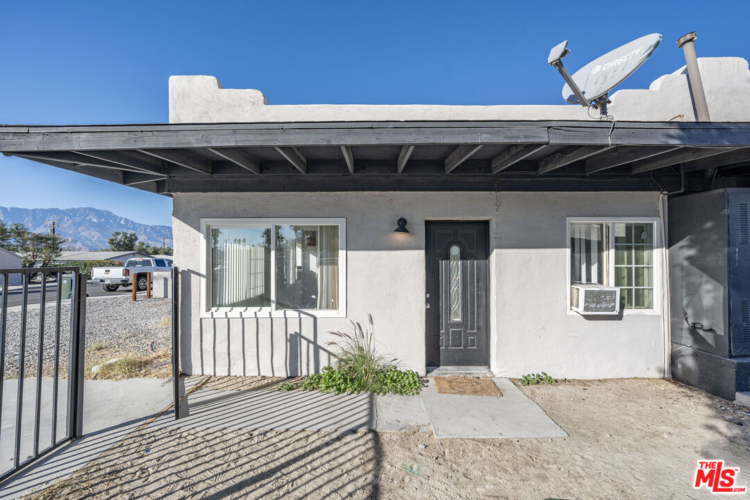 66124 Acoma Avenue, Unit C Desert Hot Springs, CA 92240 - Photo 11 of 18 a view of a porch