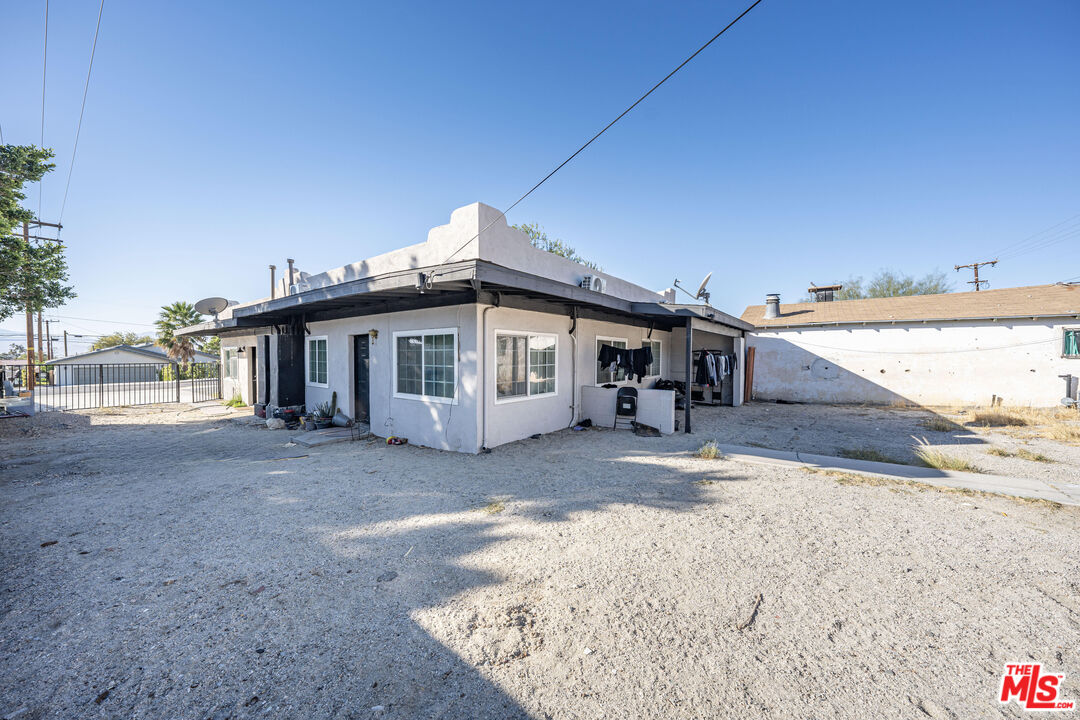 66124 Acoma Avenue, Unit C Desert Hot Springs, CA 92240 - Photo 13 of 18 a view of a house with a snow in the background