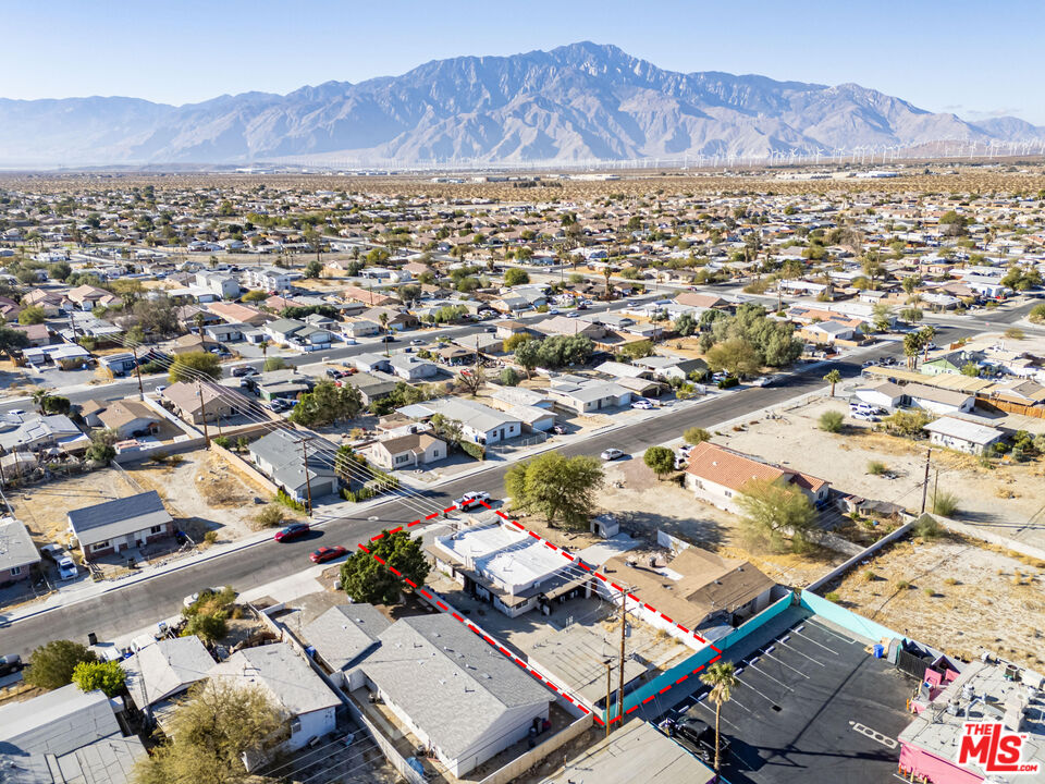 66124 Acoma Avenue, Unit C Desert Hot Springs, CA 92240 - Photo 16 of 18 an aerial view of residential house with an outdoor space