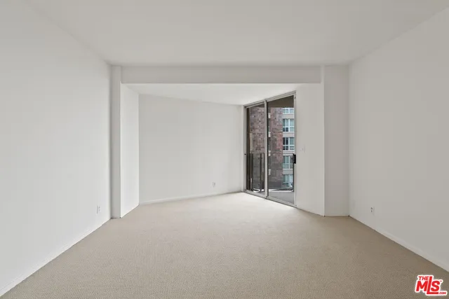 a view of an empty room with an empty room