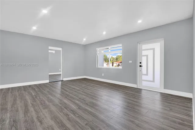 a view of a kitchen from the hallway