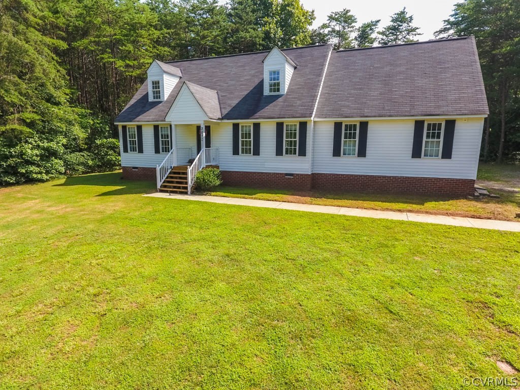 3870 Three Chopt Road Gum Spring, VA 23065 - Photo 3 of 26 a front view of a house with swimming pool