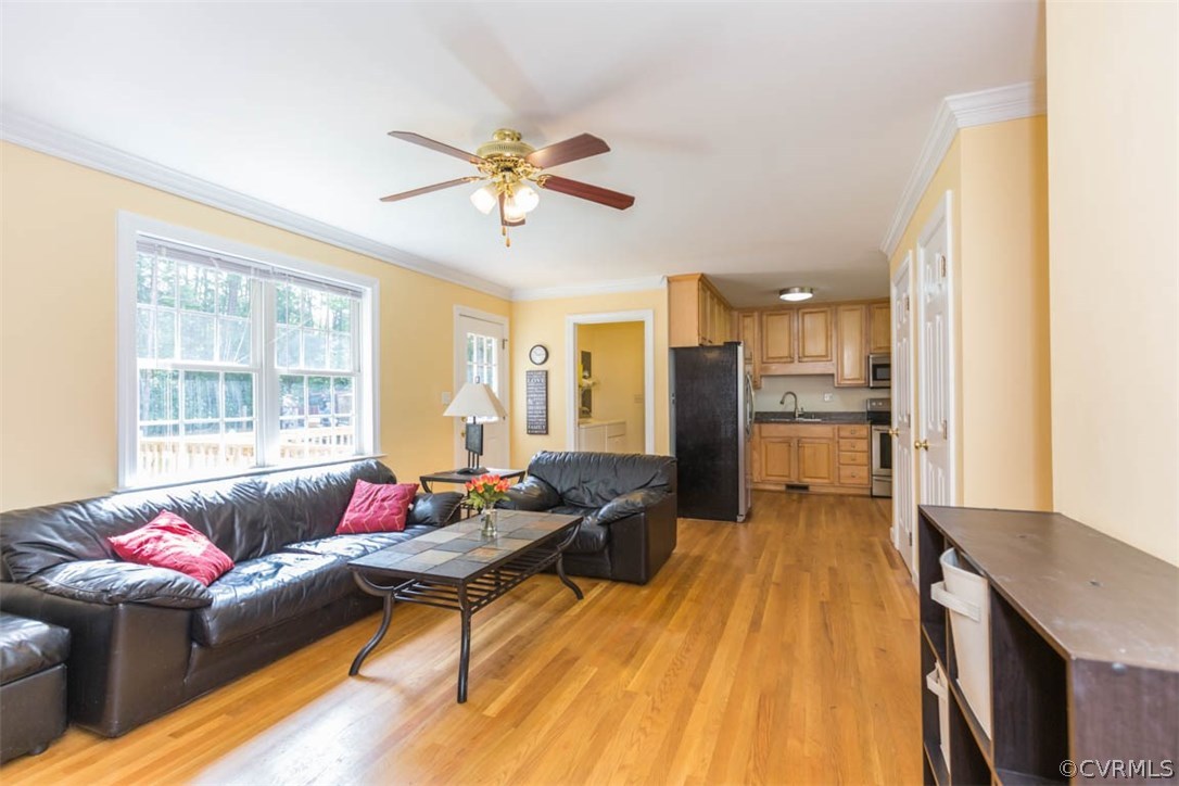 3870 Three Chopt Road Gum Spring, VA 23065 - Photo 6 of 26 a living room with furniture and a large window