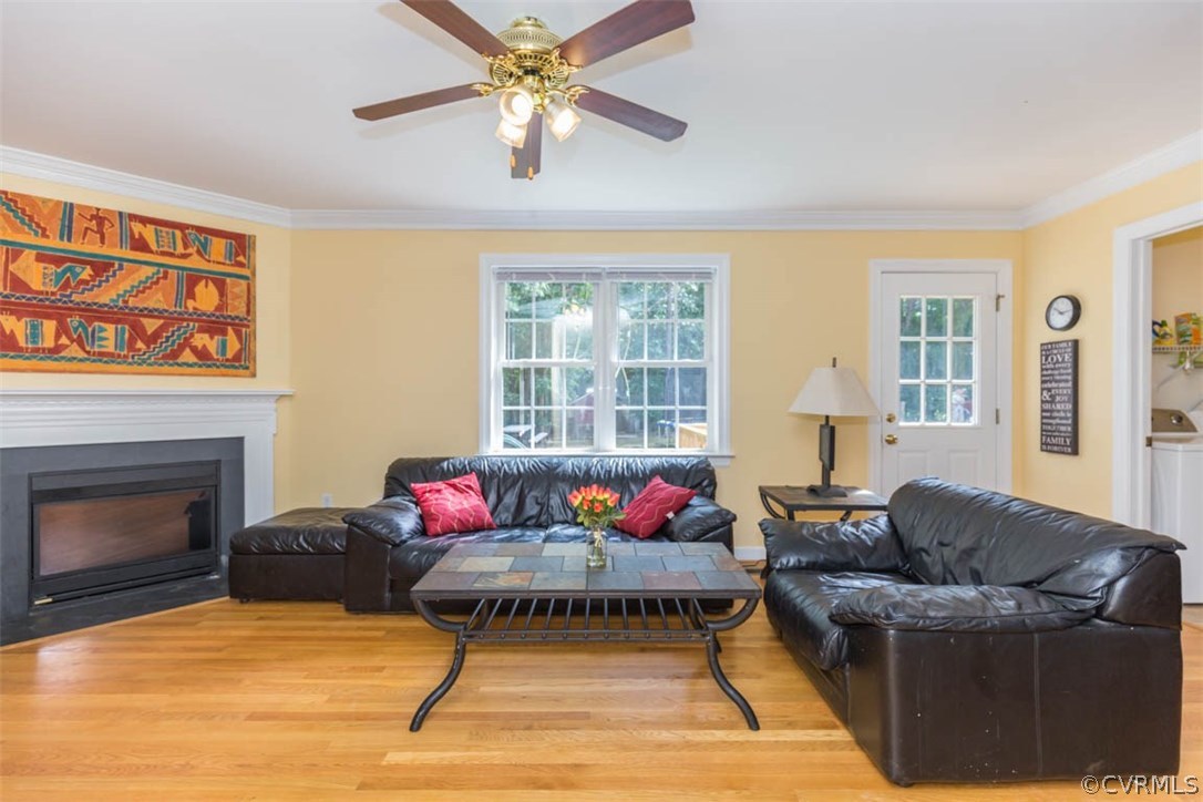 3870 Three Chopt Road Gum Spring, VA 23065 - Photo 8 of 26 a living room with furniture and a fireplace
