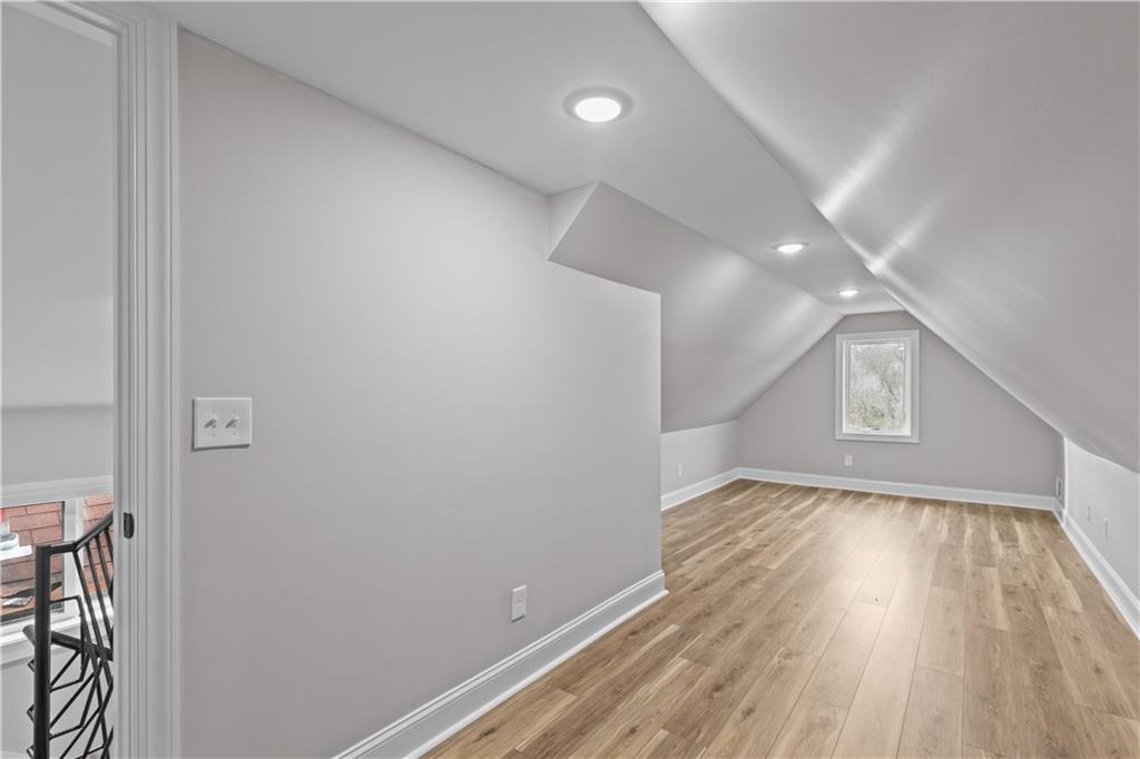 817 Eldora Place Pittsburgh, PA 15210 - Photo 21 of 29 a view of an empty room and wooden floor