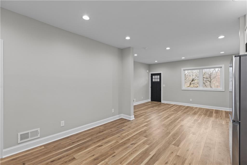 817 Eldora Place Pittsburgh, PA 15210 - Photo 9 of 29 a view of empty room with wooden floor