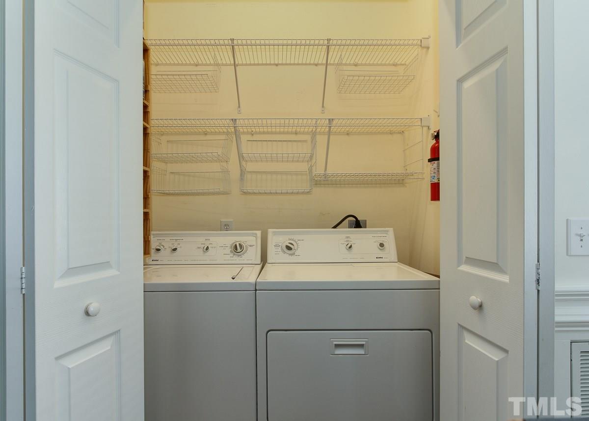 558 East Martin Street Raleigh, NC 27601 - Photo 11 of 24 a utility room with dryer and washer
