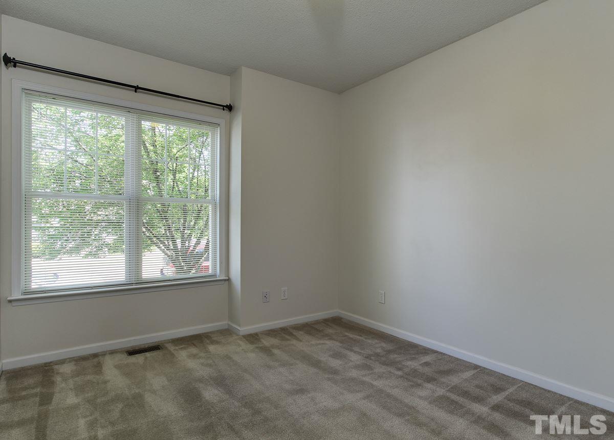 558 East Martin Street Raleigh, NC 27601 - Photo 19 of 24 a view of empty room with window