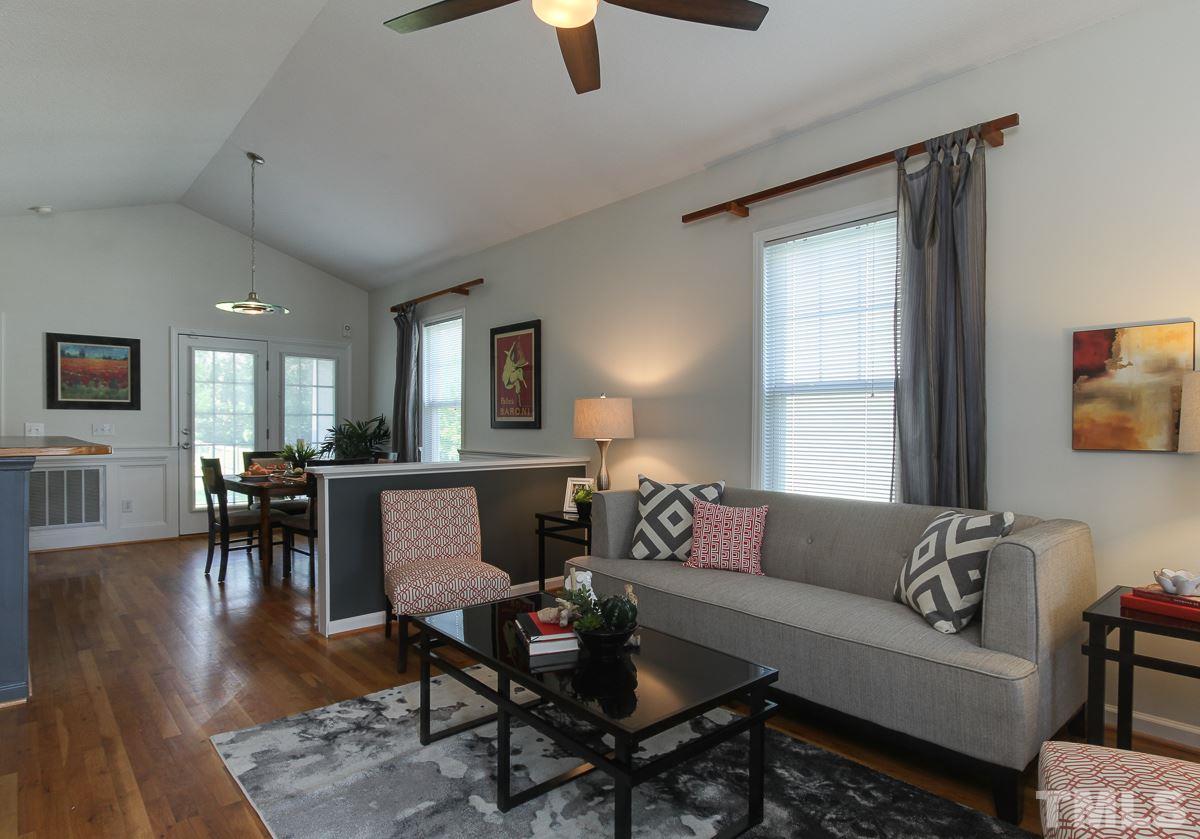 558 East Martin Street Raleigh, NC 27601 - Photo 3 of 24 a living room with furniture and a window