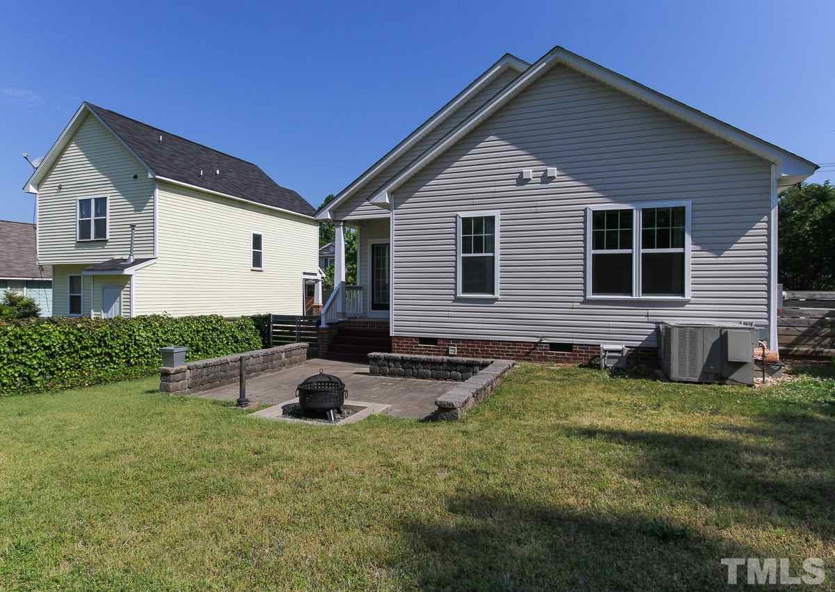 558 East Martin Street Raleigh, NC 27601 - Photo 21 of 24 a backyard of a house with seating space