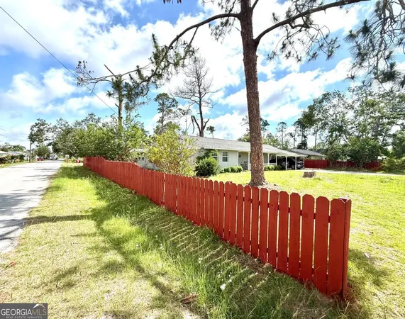 a view of a playground with basketball court