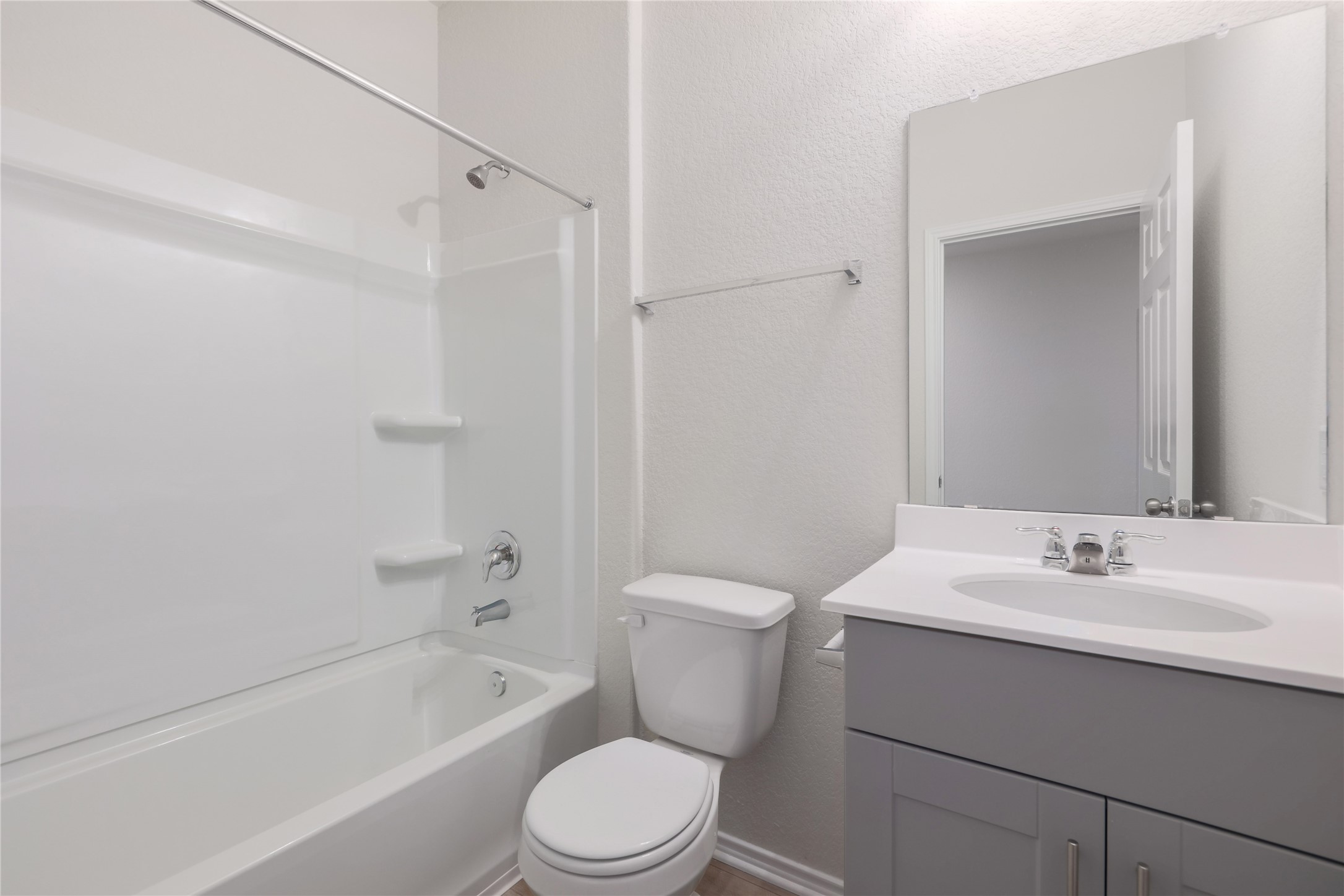 212 Sugar Cane Road Buda, TX 78610 - Photo 16 of 40 a bathroom with a sink toilet and shower