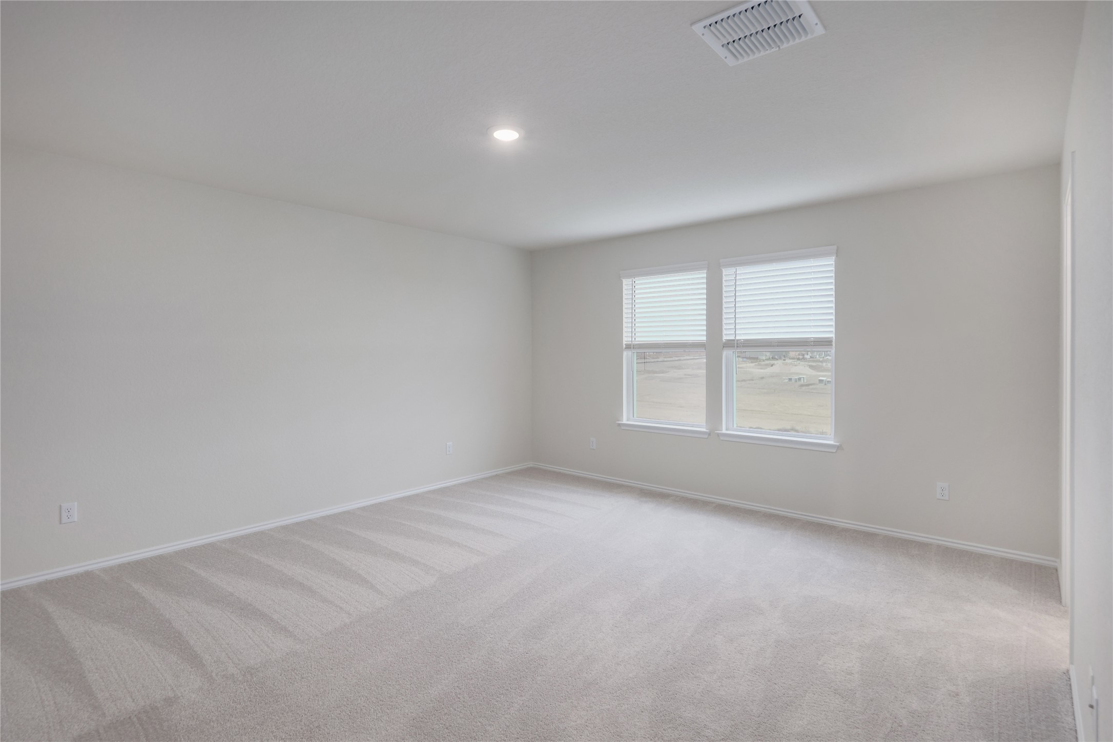 212 Sugar Cane Road Buda, TX 78610 - Photo 20 of 40 an empty room with a window