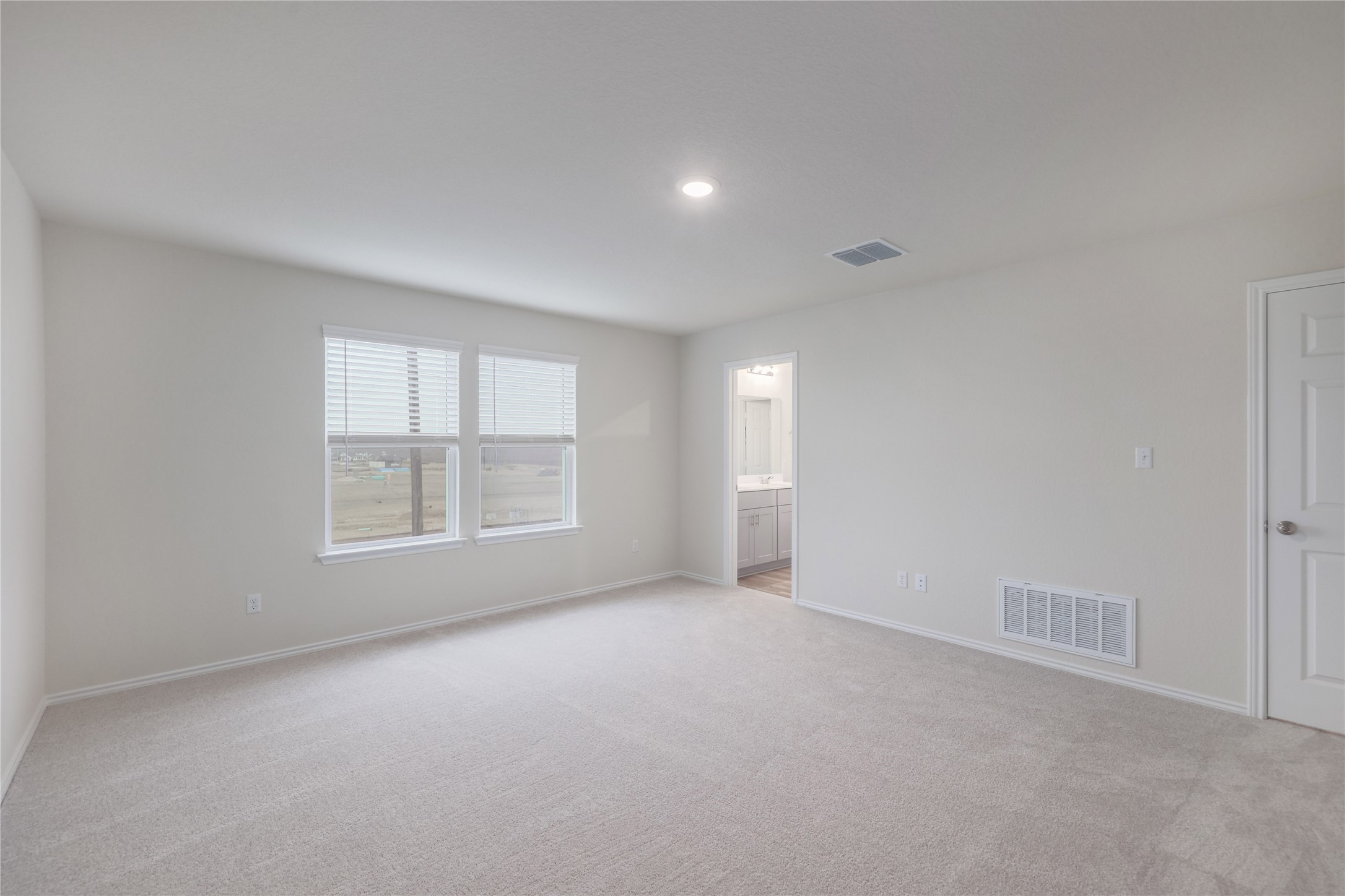 212 Sugar Cane Road Buda, TX 78610 - Photo 21 of 40 a view of an empty room with a window