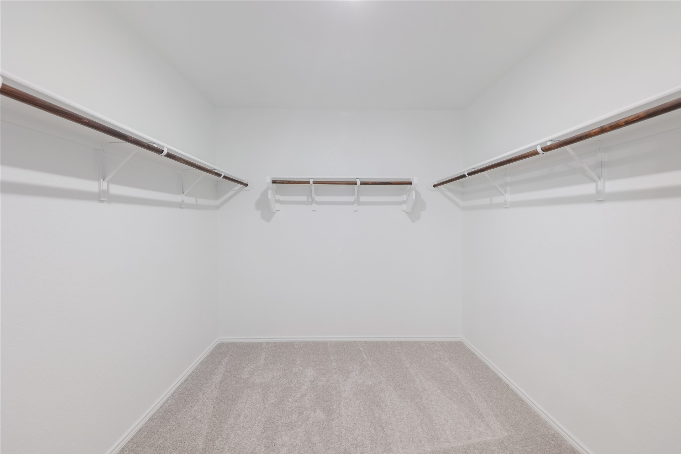 212 Sugar Cane Road Buda, TX 78610 - Photo 25 of 40 a view of an empty walk in closet