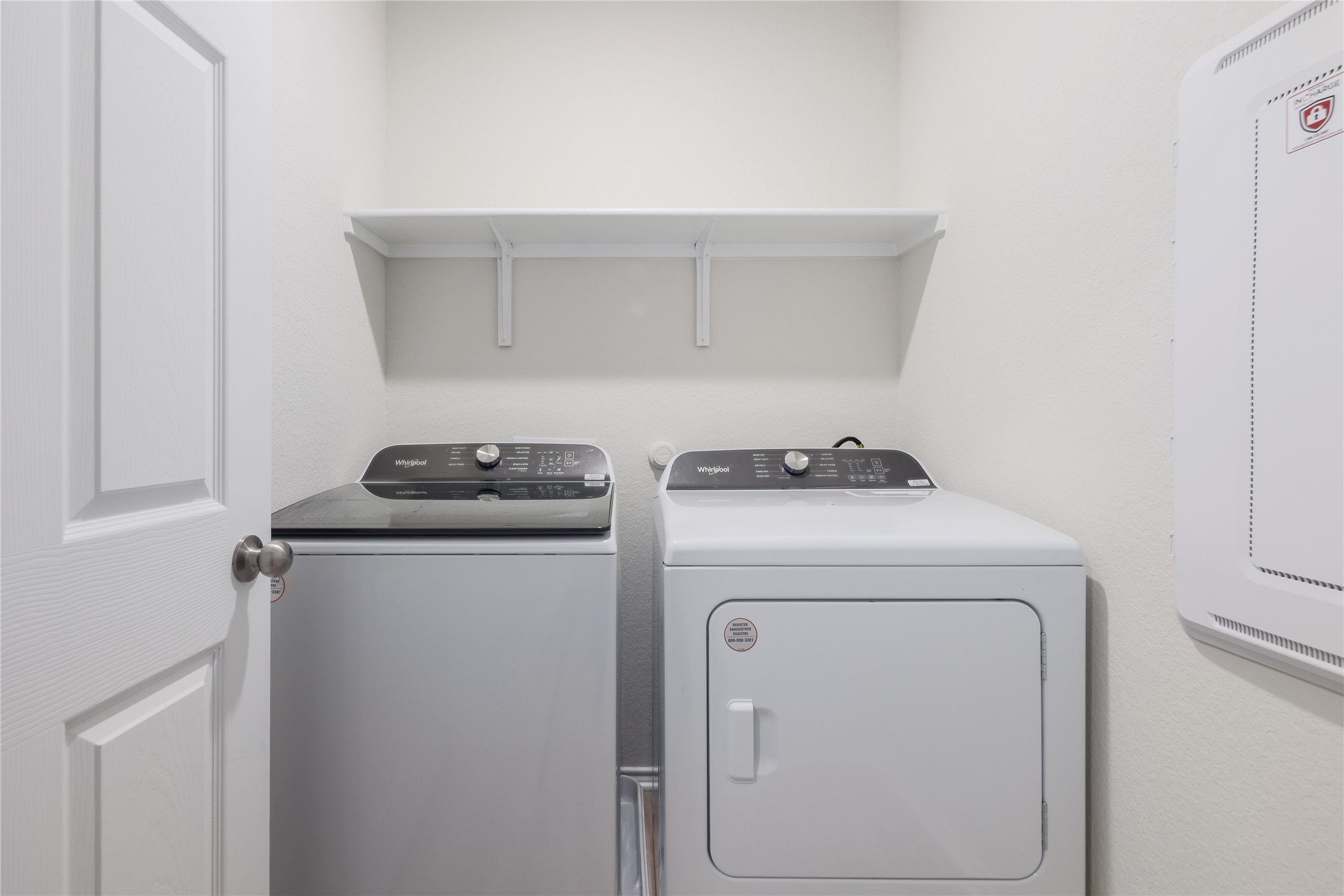 212 Sugar Cane Road Buda, TX 78610 - Photo 31 of 40 a utility room with dryer and washer