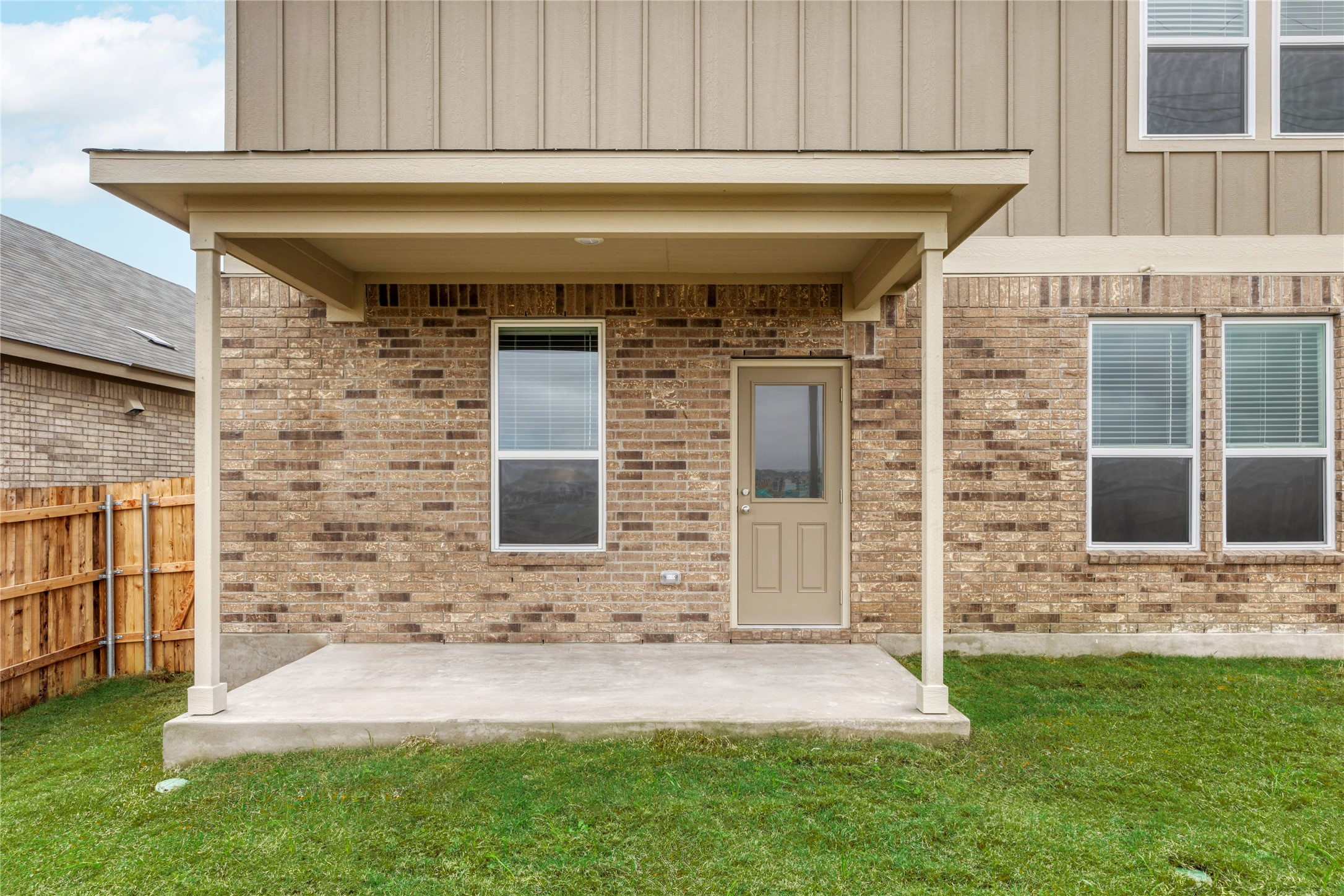 212 Sugar Cane Road Buda, TX 78610 - Photo 33 of 40 a front view of a house with a garden