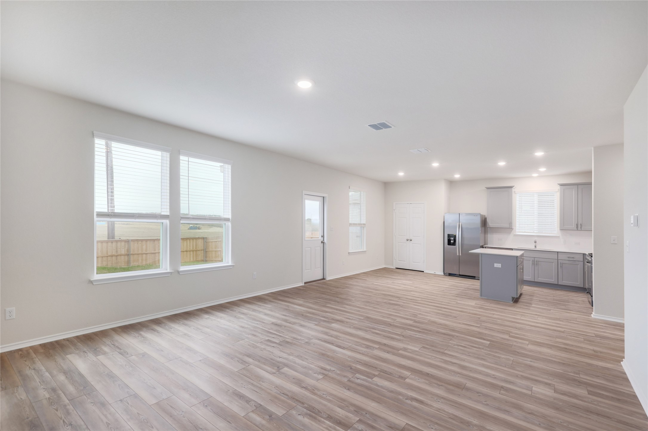 212 Sugar Cane Road Buda, TX 78610 - Photo 6 of 40 a view of kitchen and windows