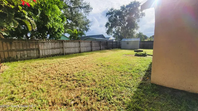 a view of a room with an empty space