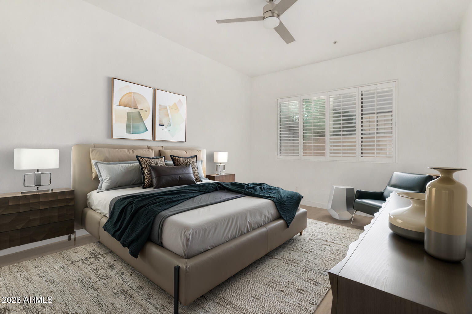 7955 East Chaparral Road, Unit 122 Scottsdale, AZ 85250 - Photo 14 of 29 a spacious bedroom with a bed and wooden floor