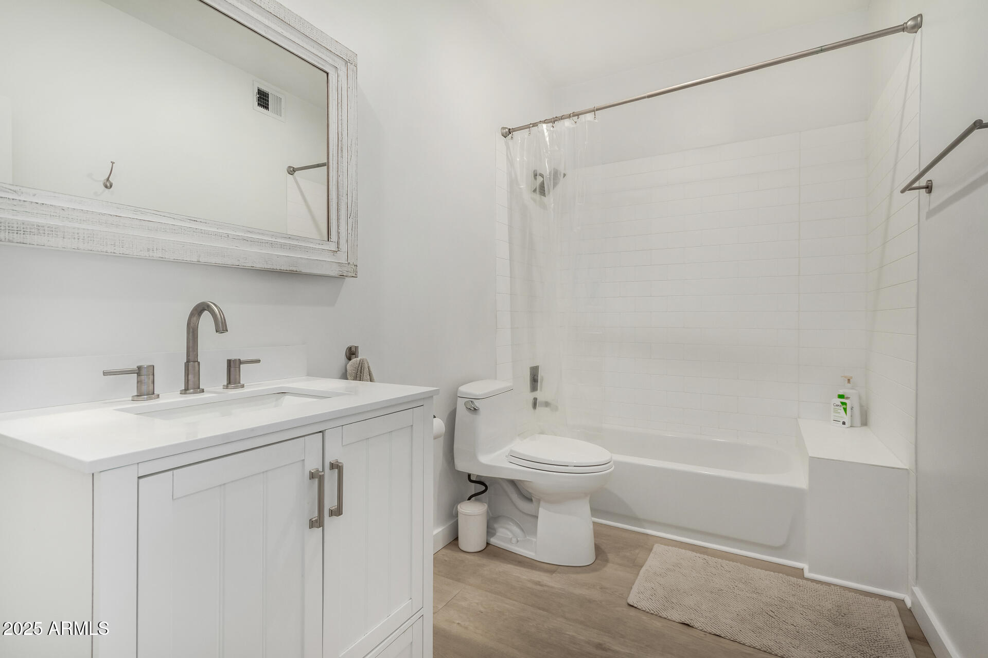 7955 East Chaparral Road, Unit 122 Scottsdale, AZ 85250 - Photo 18 of 29 a bathroom with a sink toilet and shower