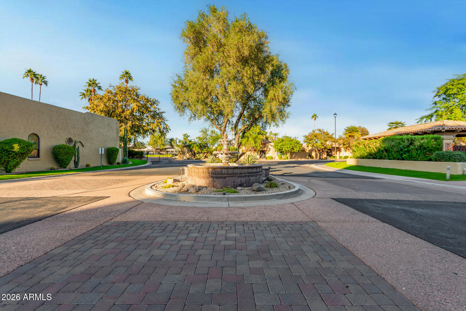 7955 East Chaparral Road, Unit 122 Scottsdale, AZ 85250 - Photo 27 of 29 a view of yard with yellow lighting