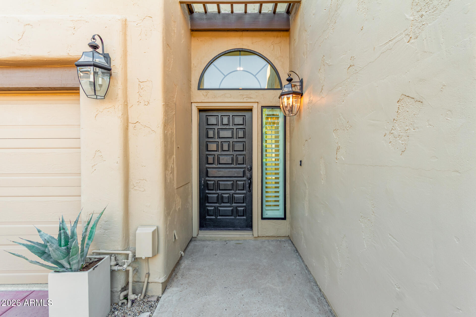 7955 East Chaparral Road, Unit 122 Scottsdale, AZ 85250 - Photo 3 of 29 a view of a entryway door of the house