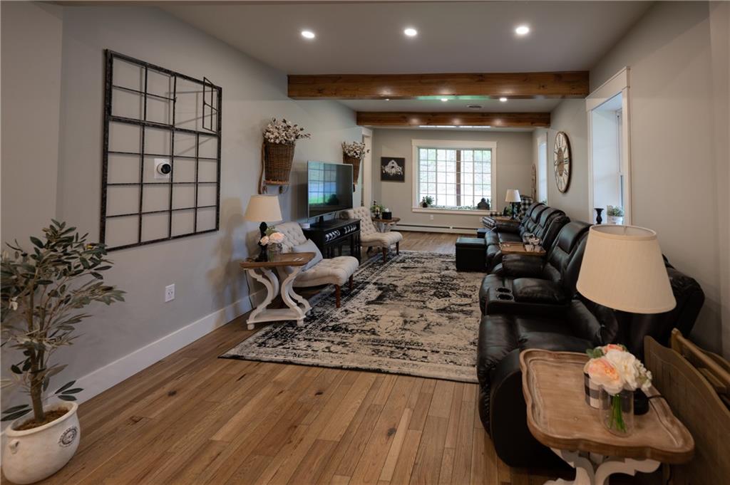 304 Ellermeyer Road Walston, PA 15781 - Photo 11 of 50 a living room with furniture and a wooden floor