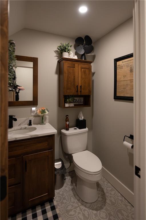 304 Ellermeyer Road Walston, PA 15781 - Photo 17 of 50 a bathroom with a toilet a sink and mirror