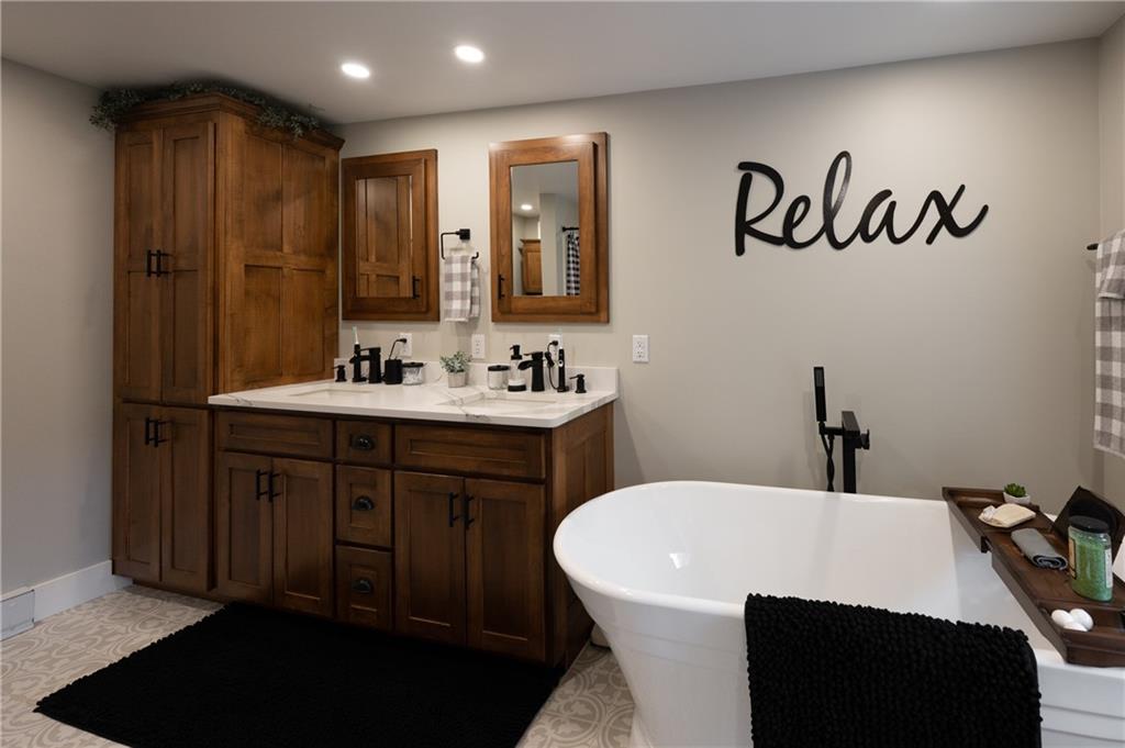 304 Ellermeyer Road Walston, PA 15781 - Photo 24 of 50 a bathroom with a sink and a mirror