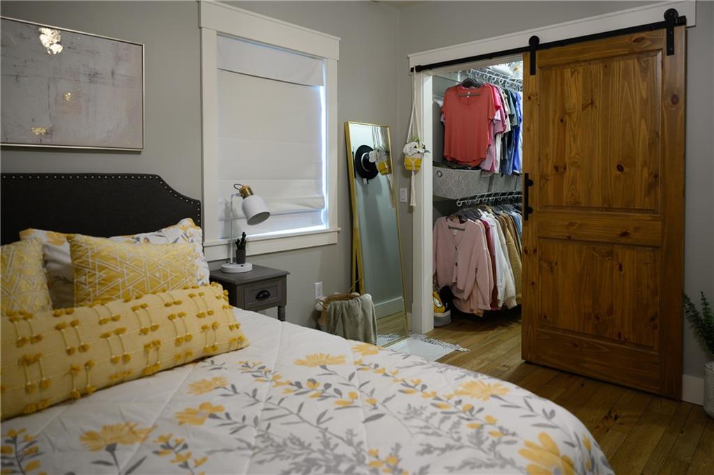 304 Ellermeyer Road Walston, PA 15781 - Photo 36 of 50 a bedroom with a bed and a mirror