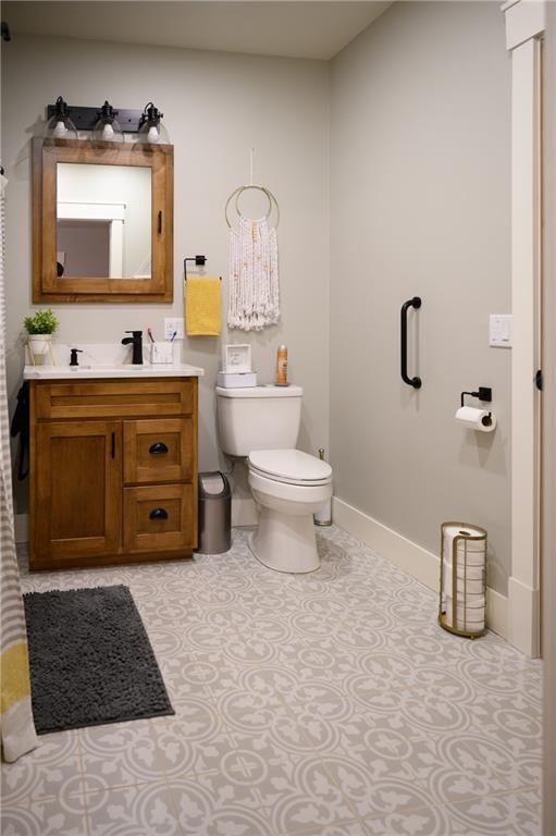 304 Ellermeyer Road Walston, PA 15781 - Photo 37 of 50 a bathroom with a toilet sink and mirror