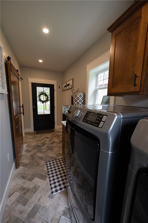 304 Ellermeyer Road Walston, PA 15781 - Photo 9 of 50 a kitchen with granite countertop a sink a stove a washer and dryer