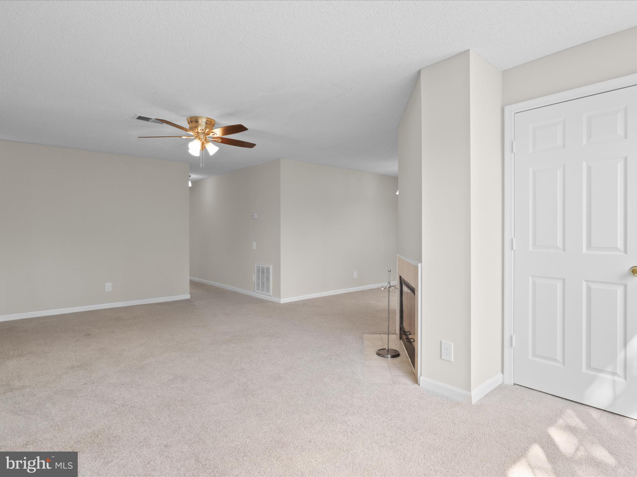 12008 Golf Ridge Court, Unit 356 Fairfax, VA 22033 - Photo 5 of 33 an empty room with windows