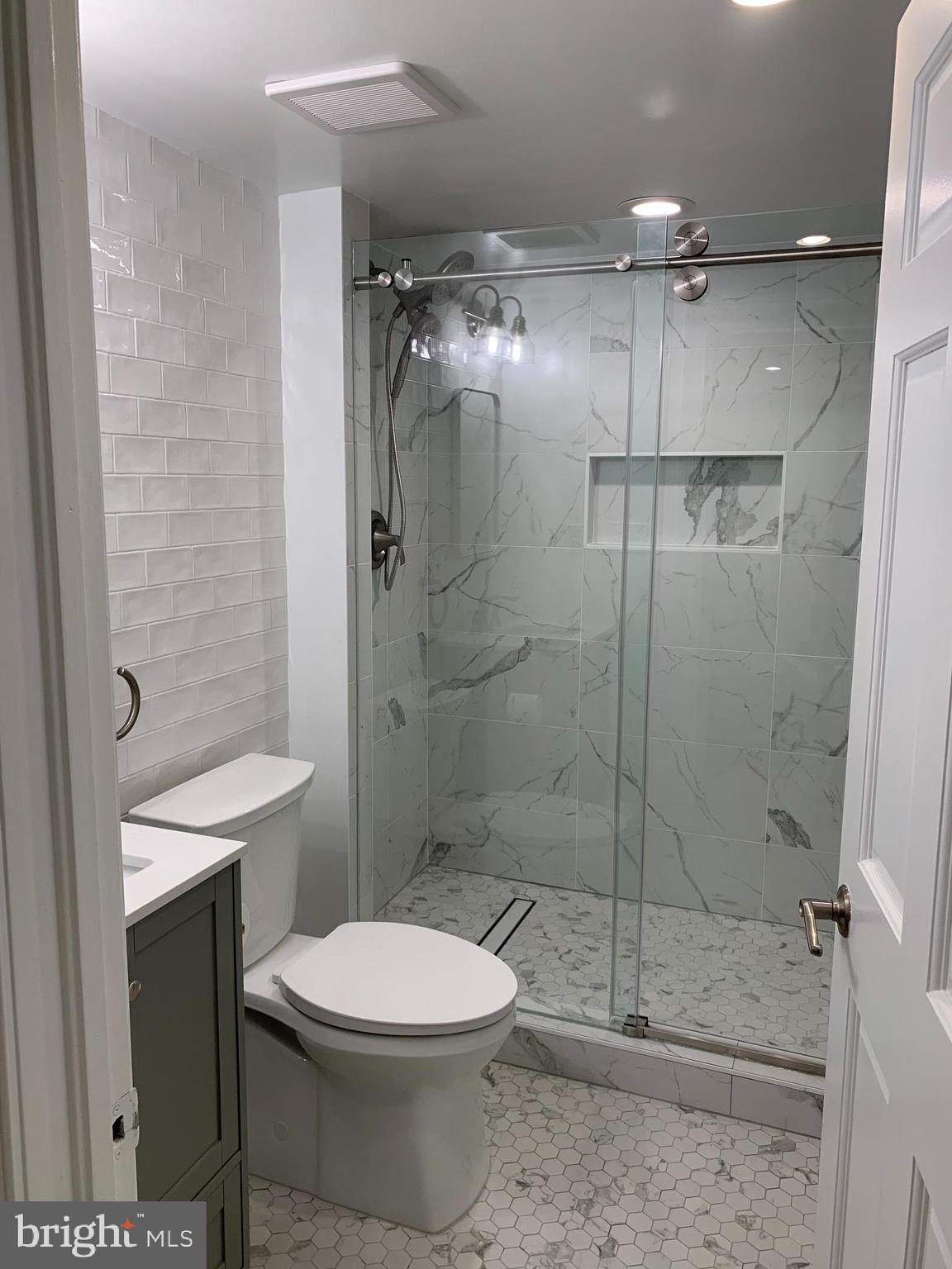 612 C Street Southeast Washington, DC 20003 - Photo 16 of 20 a bathroom with a toilet a sink and shower