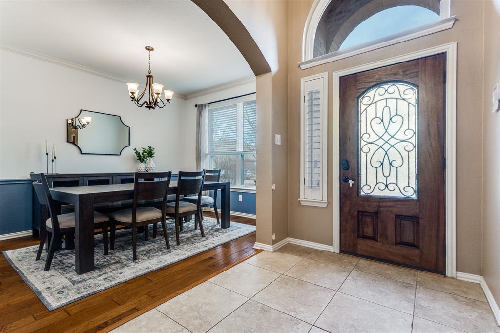 1524 Rustic Timbers Lane Flower Mound, TX 75028 - Photo 4 of 28 a view of a dining room with furniture