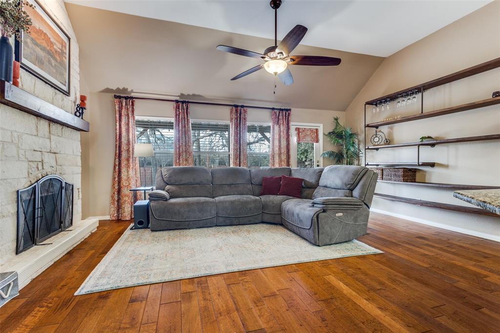 1524 Rustic Timbers Lane Flower Mound, TX 75028 - Photo 9 of 28 a living room with furniture and a fireplace