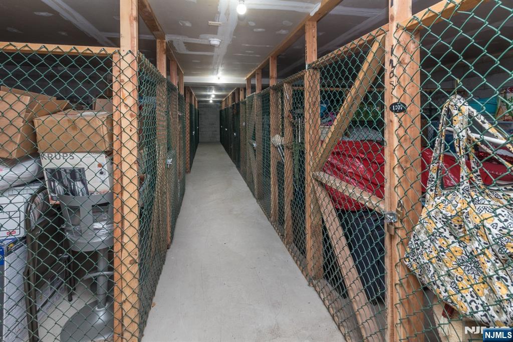 1103 Hilltop Road Mahwah, NJ 07430 - Photo 17 of 17 a view of walk in closet with clothes and shoes