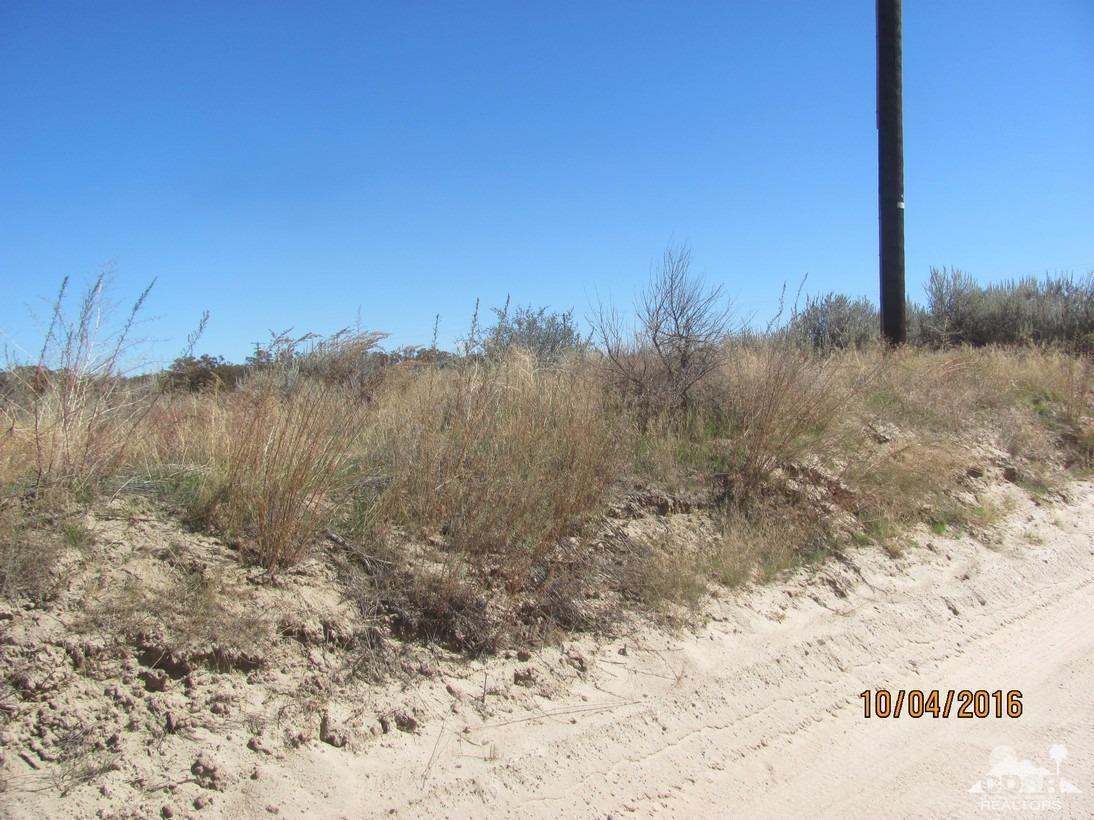0 Howard Road Anza, CA 92539 - Photo 5 of 12 a view of a dry yard with trees