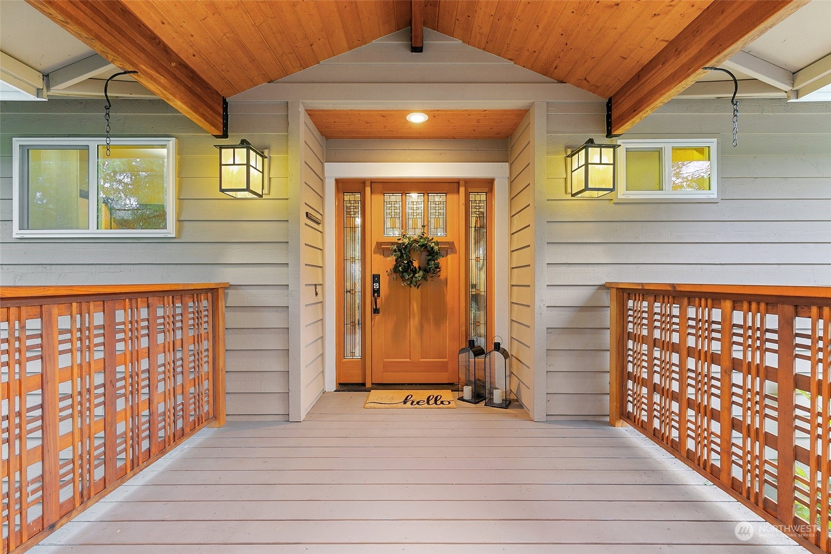 22214 Sweeney Road Southeast Maple Valley, WA 98038 - Photo 2 of 40 a view of entryway with a front door and wooden floor