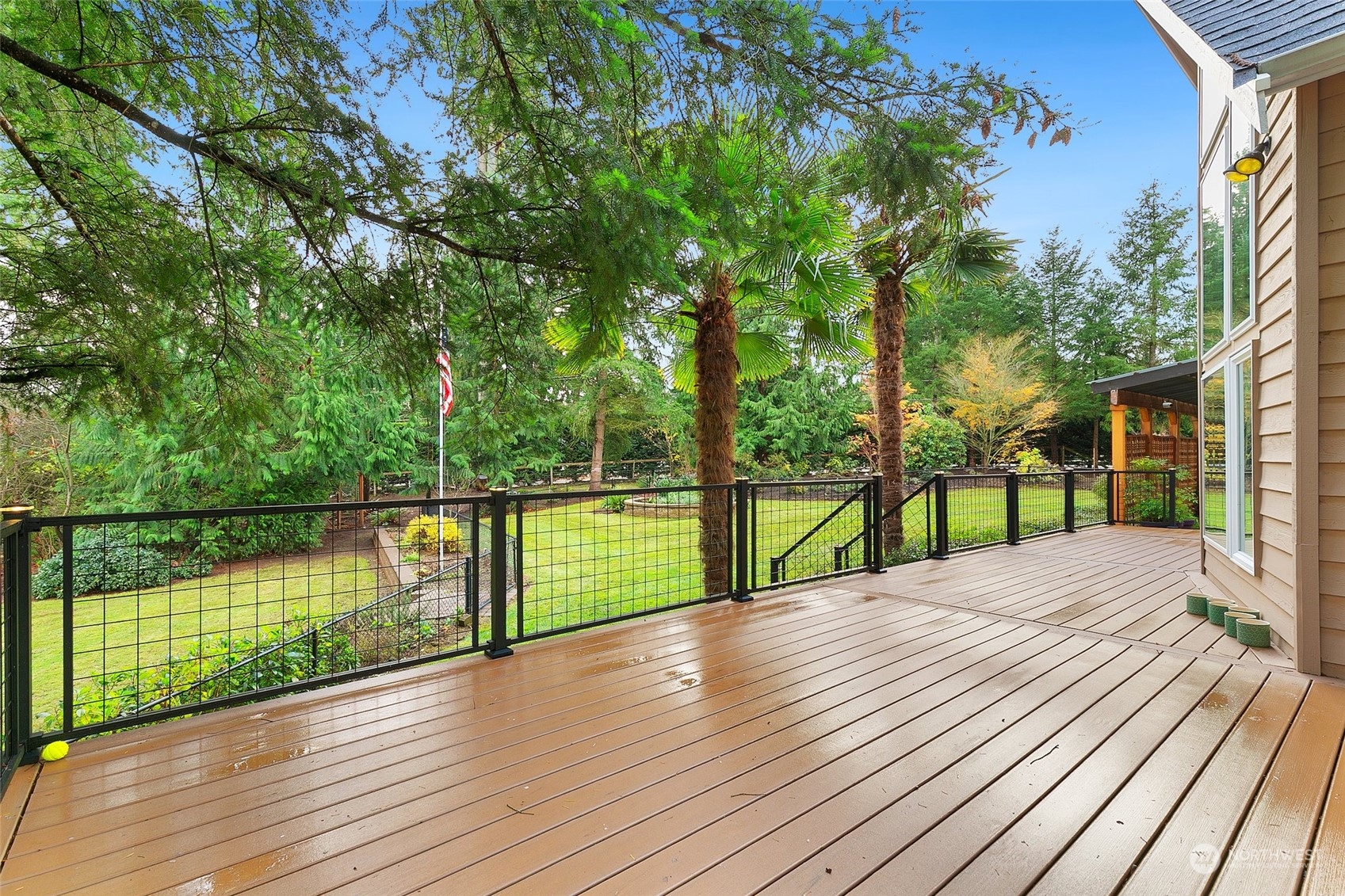 22214 Sweeney Road Southeast Maple Valley, WA 98038 - Photo 32 of 40 a view of wooden floor and lake view