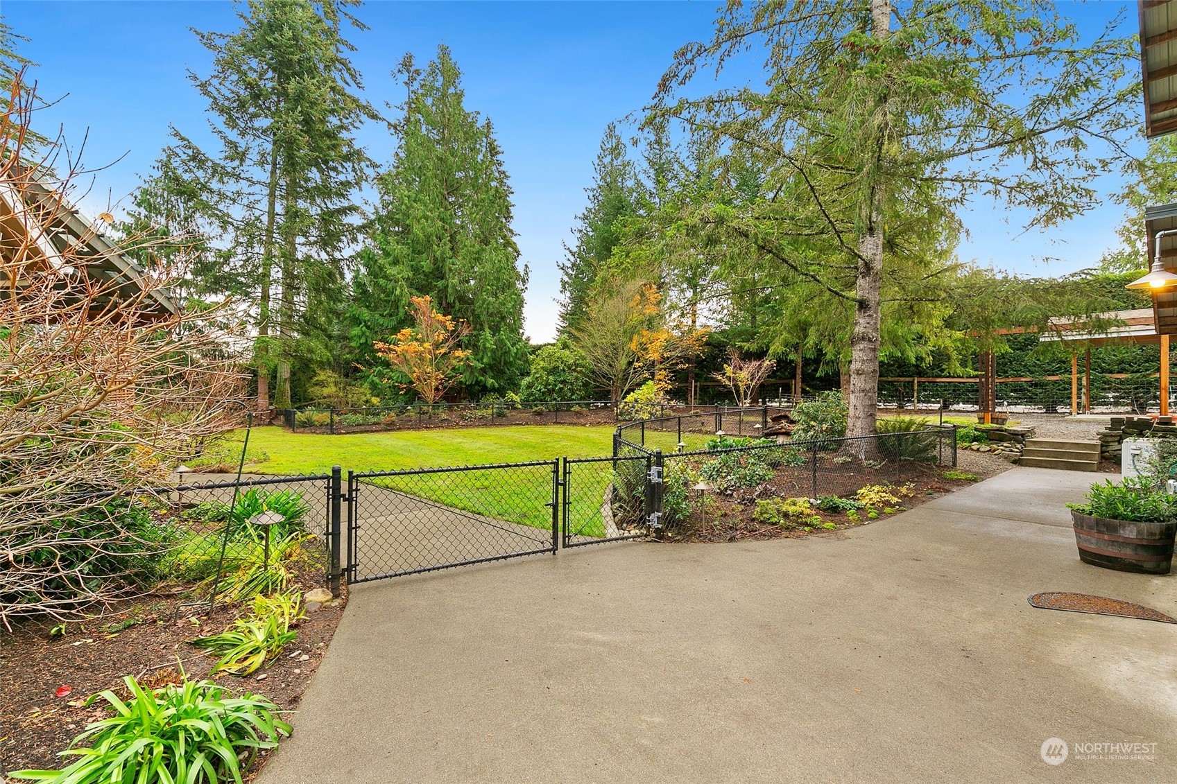 22214 Sweeney Road Southeast Maple Valley, WA 98038 - Photo 35 of 40 a view of swimming pool with a patio