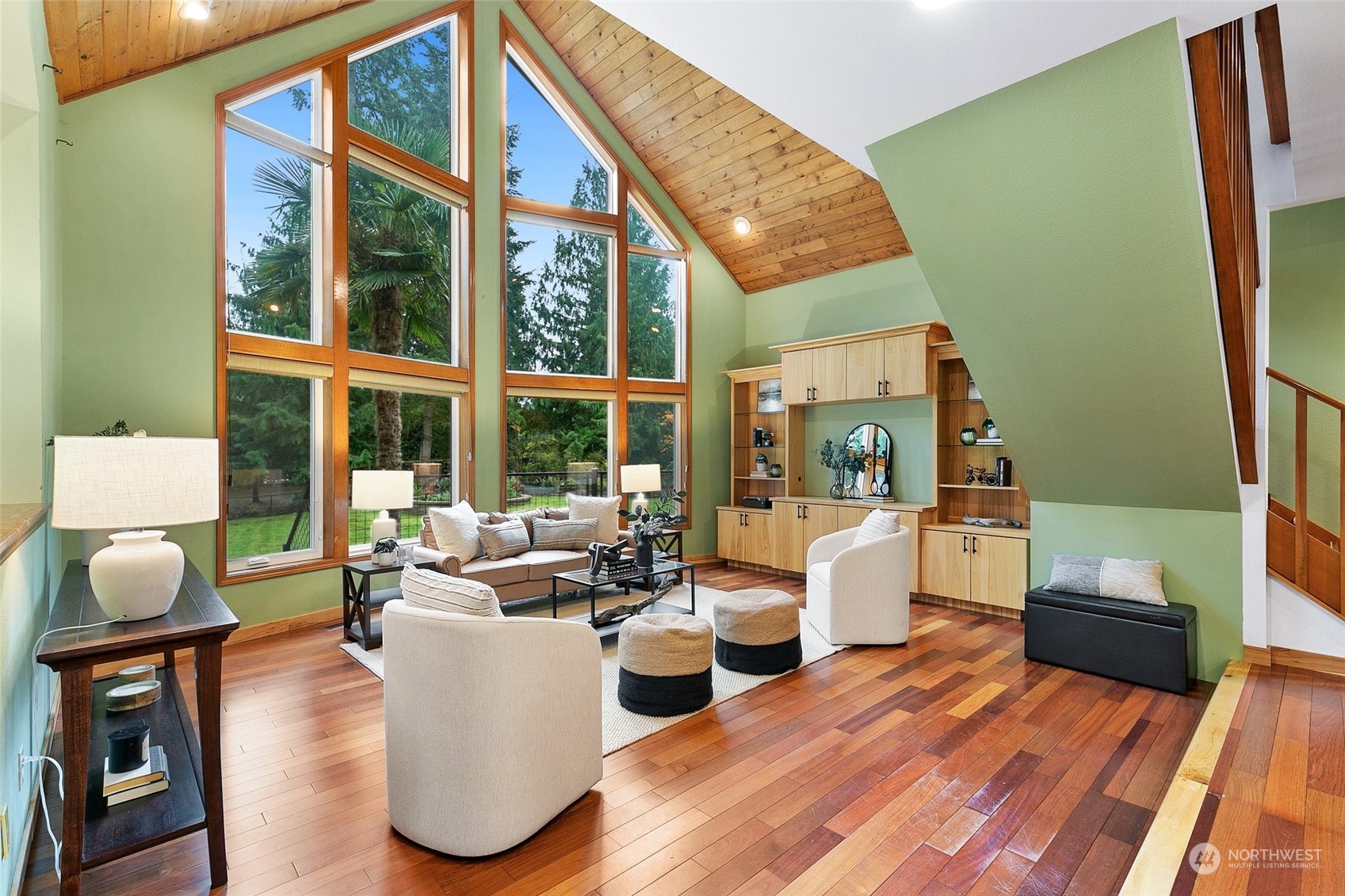 22214 Sweeney Road Southeast Maple Valley, WA 98038 - Photo 4 of 40 a living room with fireplace furniture and a large window